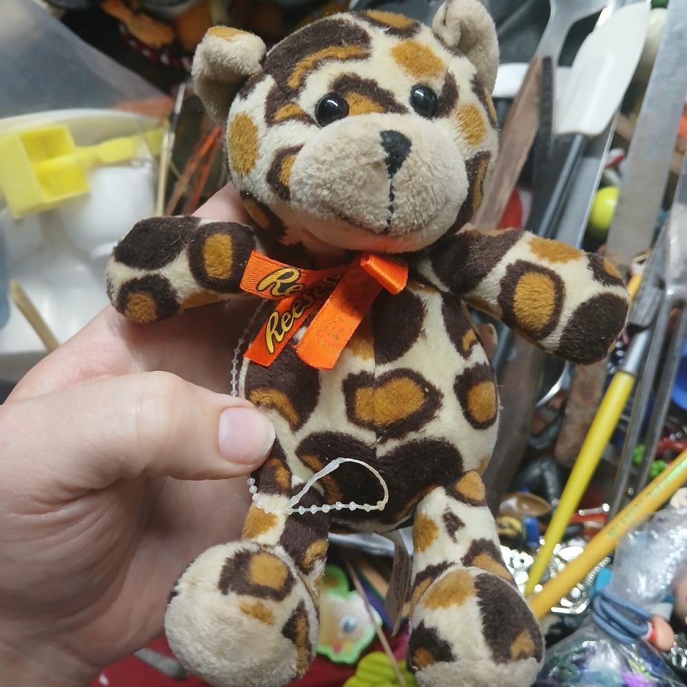Leopard-Print Plush Bear with Orange Ribbon